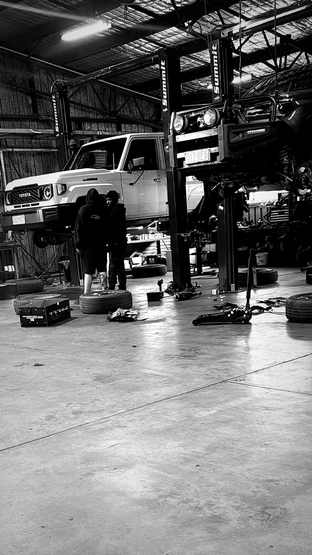 GEN5020 workshop with vehicles on hoists in Rocklea
